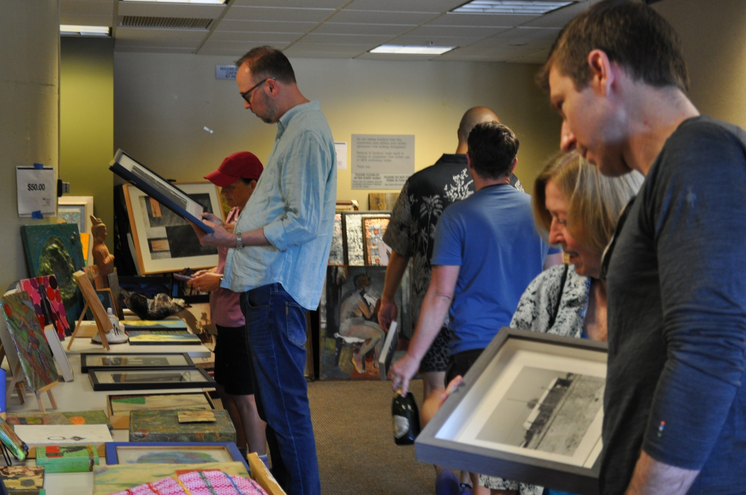 person looking at art 